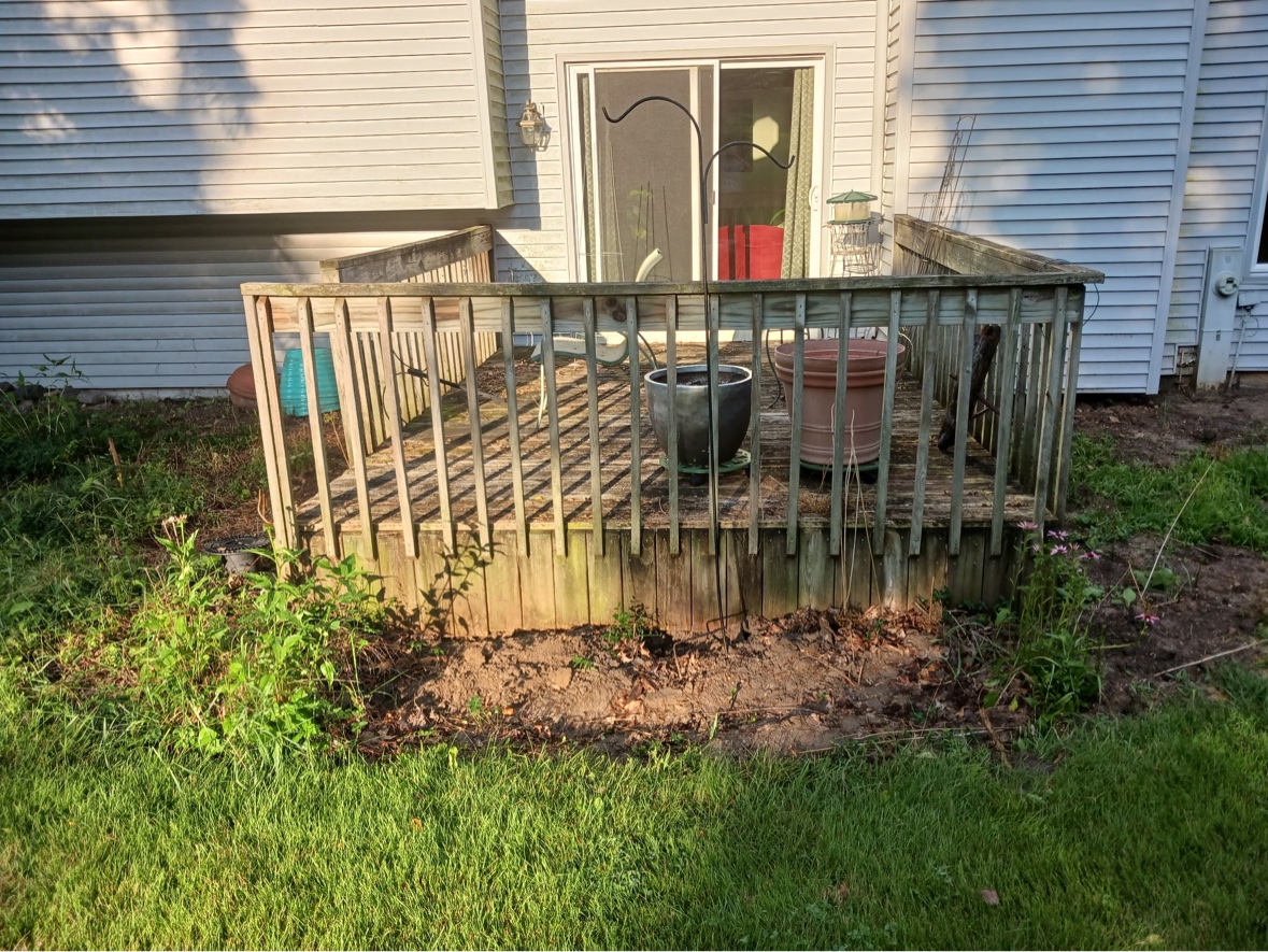 Weathered deck standing before demolition